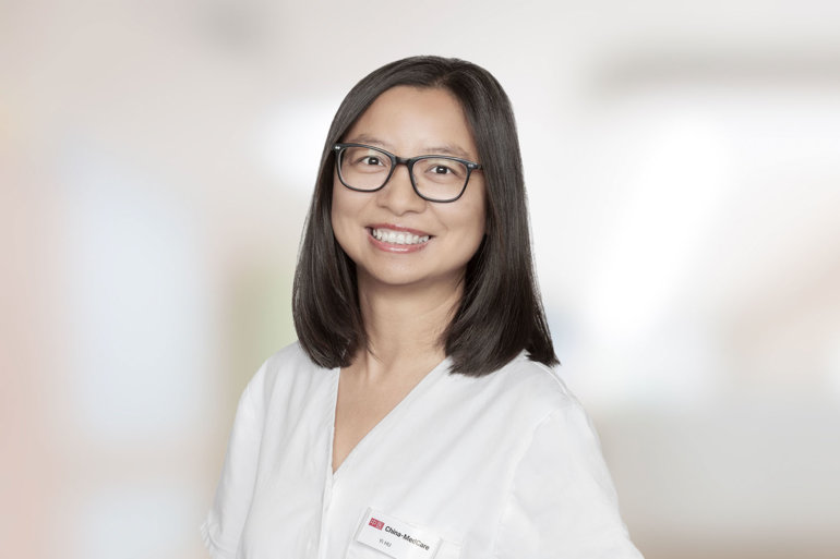 Yi HU